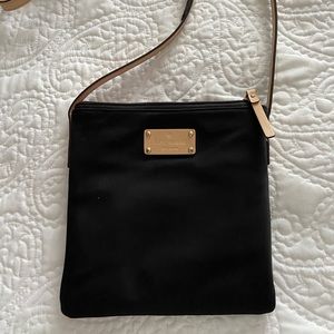 Kate Spade black & tan crossbody bag.